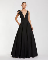 Sleeveless Plunge Neck Ball Gown With Bow Detail