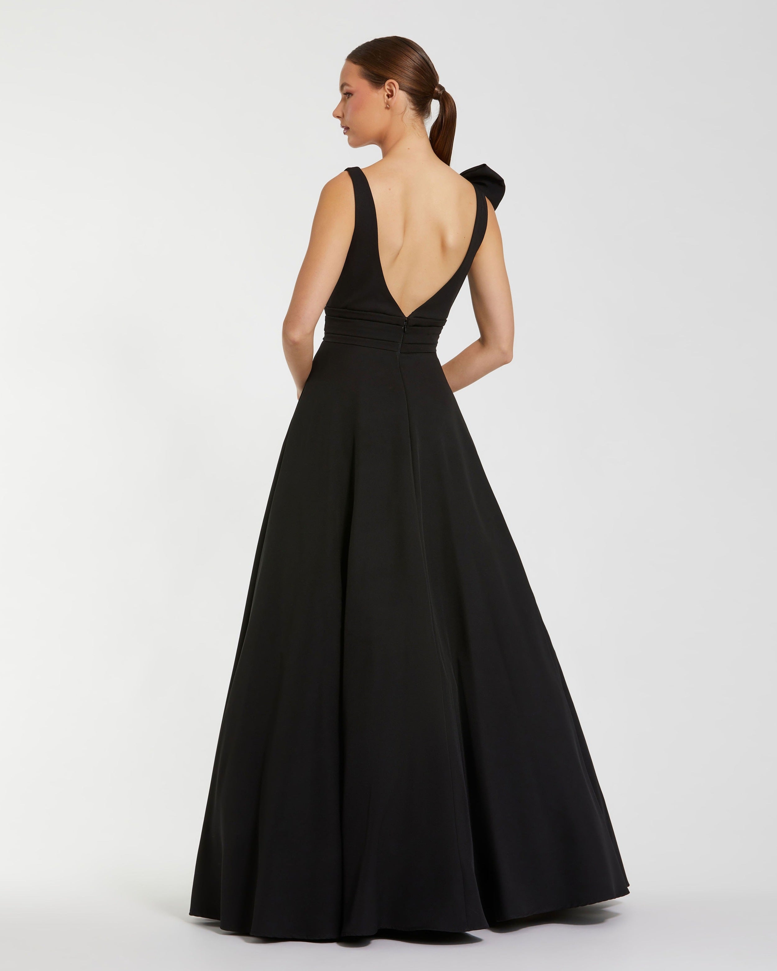 Black Sleeveless Plunge Neck Ball Gown With Bow Detail